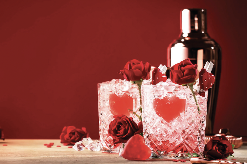 drink glasses with shaker and rose petals