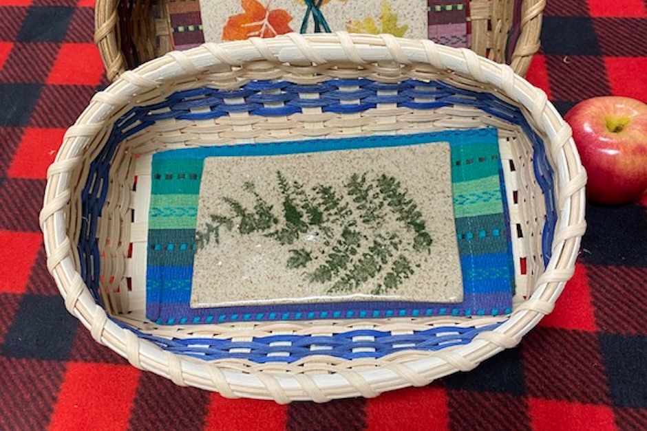 woven bread basket with warming stone inside