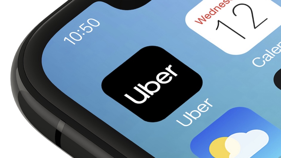 closeup of an uber logo on a phone screen