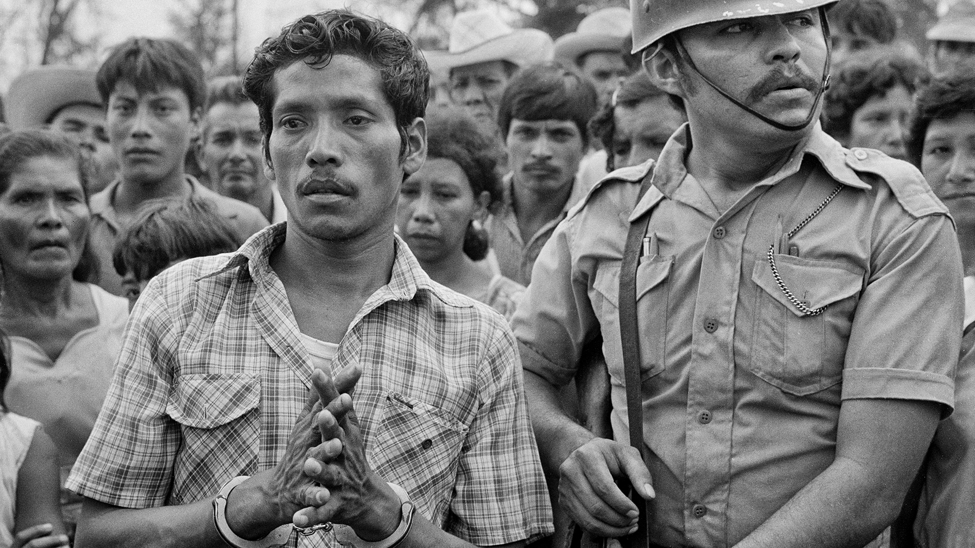 men standing in front of a crowd