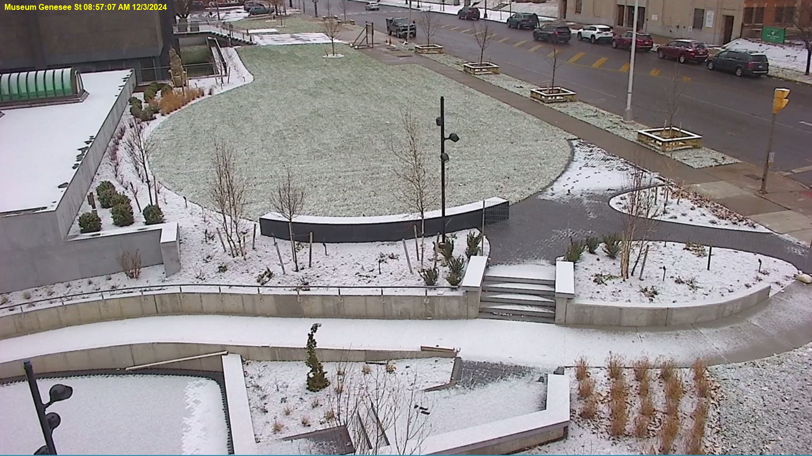 View of Genesee Street front lawn, the ramp is mostly completed and the trees and shrubs are planted.