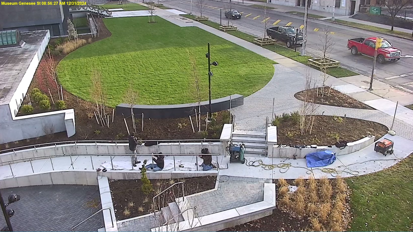 View of Genesee Street front lawn, the ramp is mostly completed and the trees and shrubs are planted.