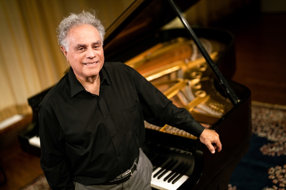 jeffrey siegel standing next to piano